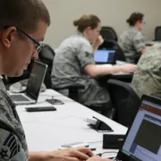 US Army personnel engaged in cyber workforce training.